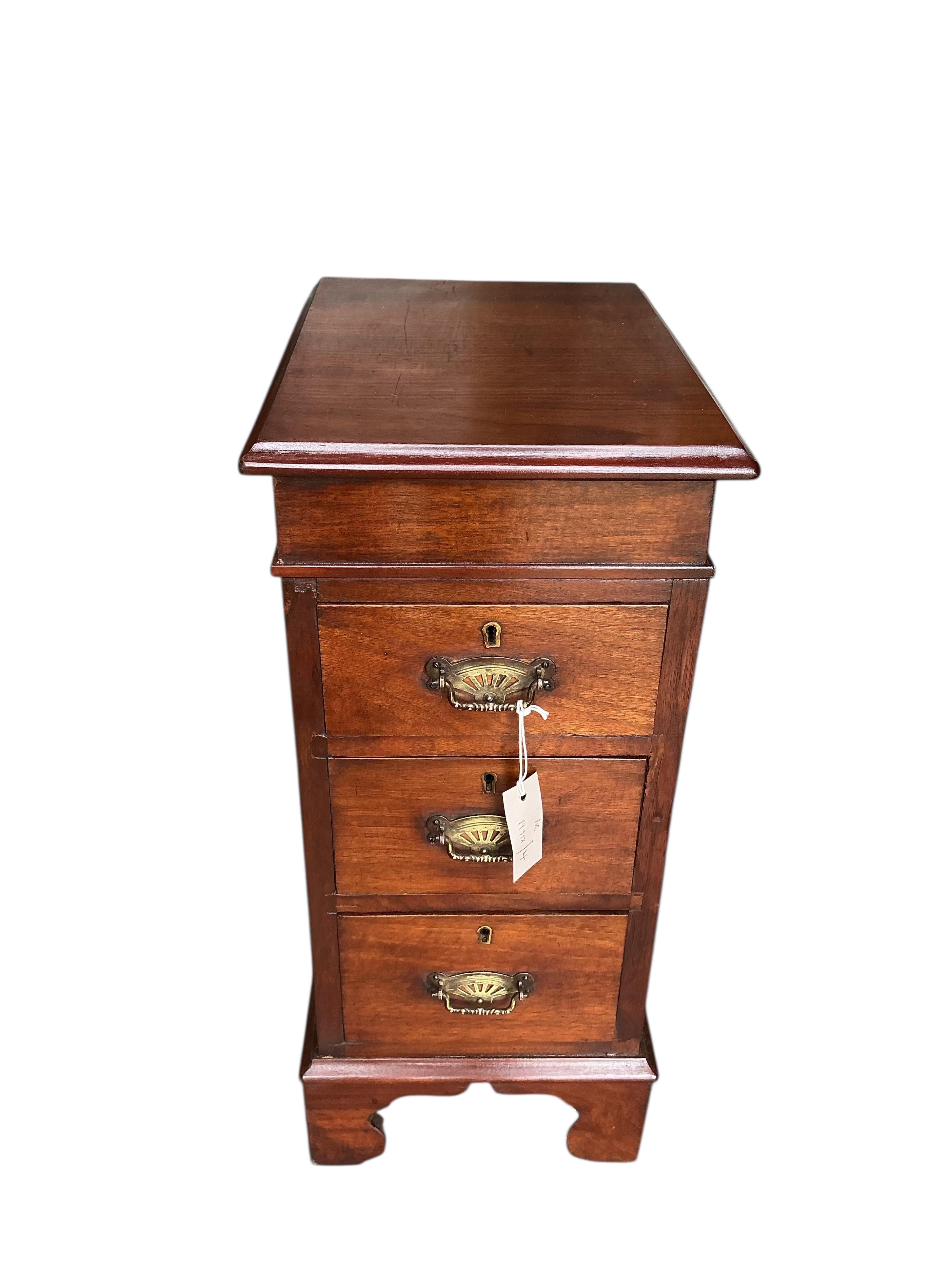 A pair of Victorian style mahogany three drawer bedside chests, width 30cm, depth 40cm, height 68cm